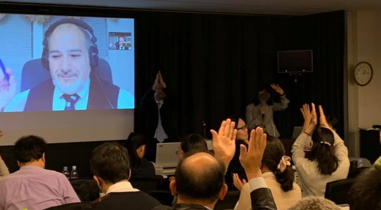 Dr Jess lecturing in Osaka, Japan in 2019